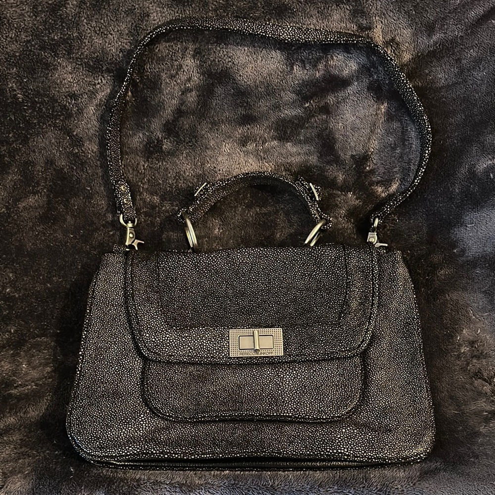 Gently used Rebecca Minkoff Black/Silver Starfish Leather purse